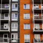 Apartments with front-facing porches and windows