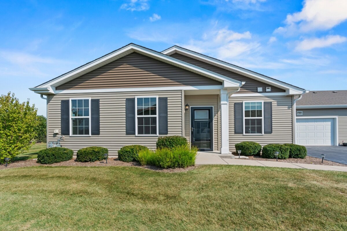 single family home with blue door